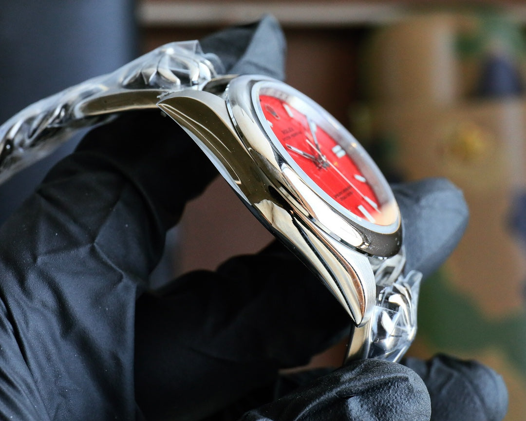 Rolex Oyster Perpetual 41mm Silver Red Dial