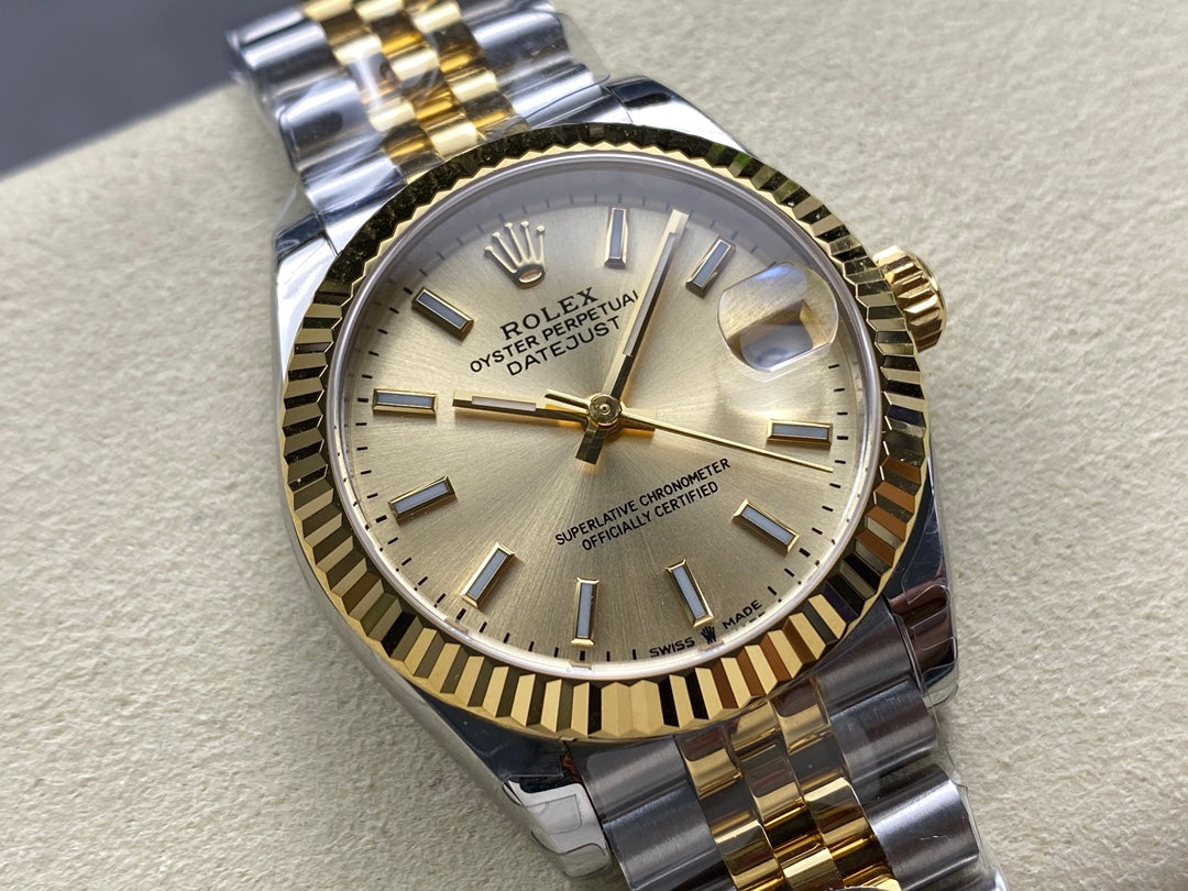Datejust 31mm Yellow Gold Steel Champagne Dial