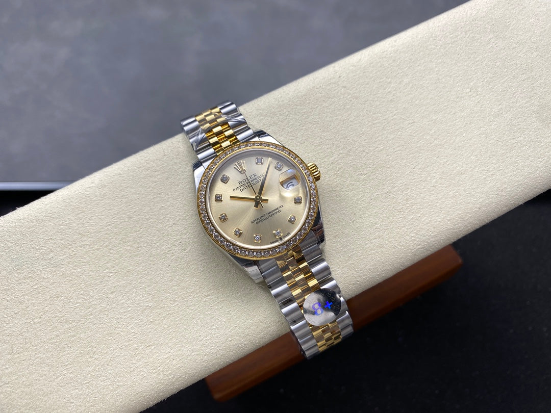 Datejust 31mm Yellow Gold Steel Diamond Bezel Champagne Dial Diamond Numerals